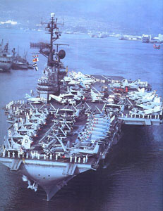 The aircraft carrier USS Coral Sea (CVA-43) leaving Pearl Harbor (Hawaii, USA) in April 1963. 